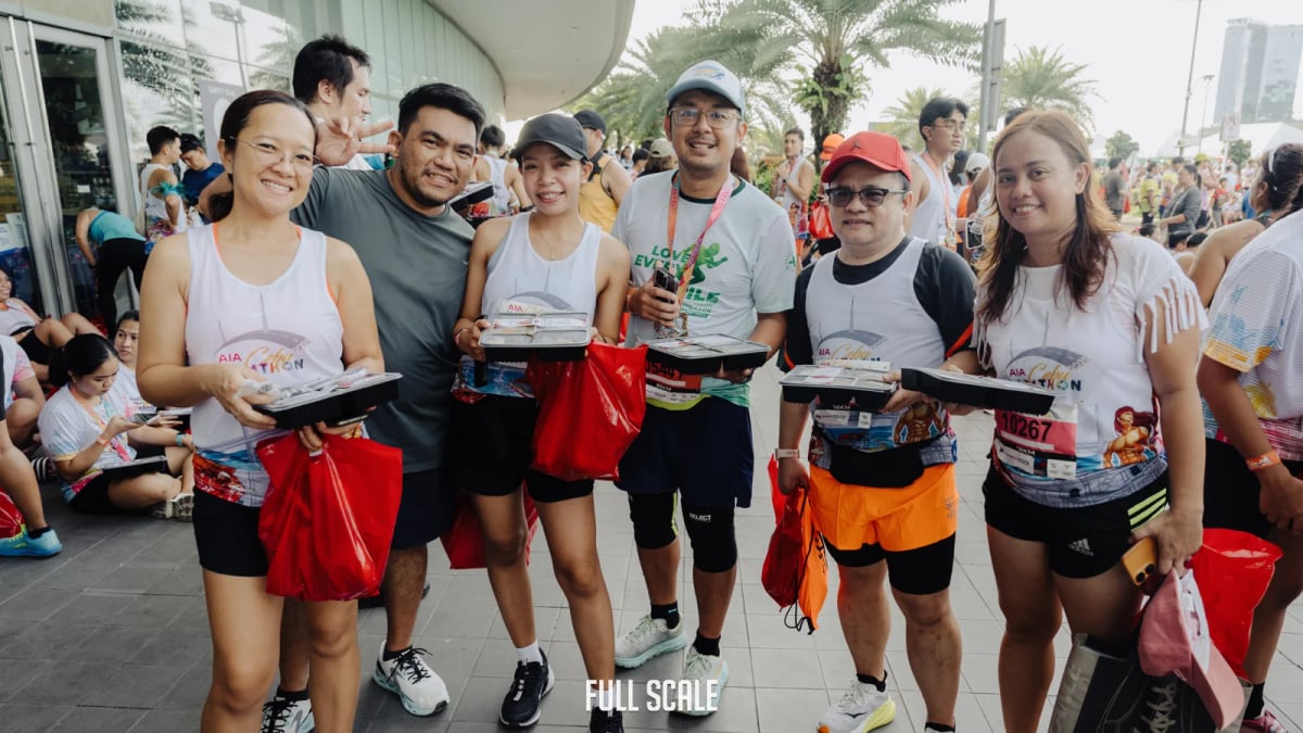 Full Scale employees running together at the Cebu Marathon company event