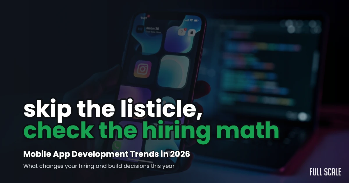 Mobile app development trends in 2026: a smartphone showing an app interface with a laptop displaying code blurred in the background