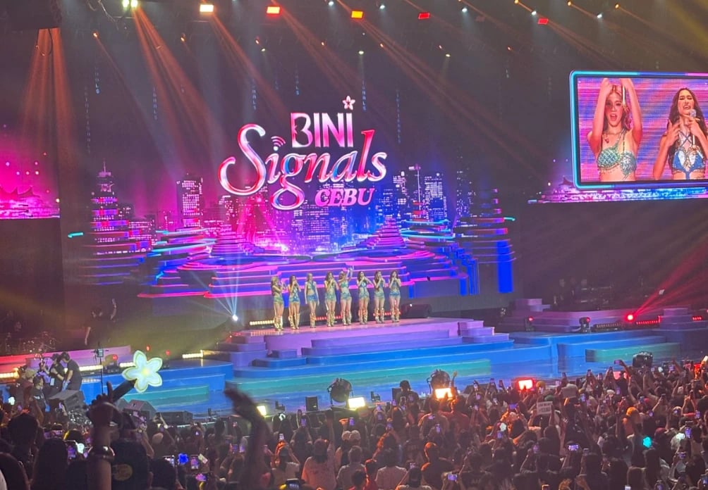 BINI performing on stage at the