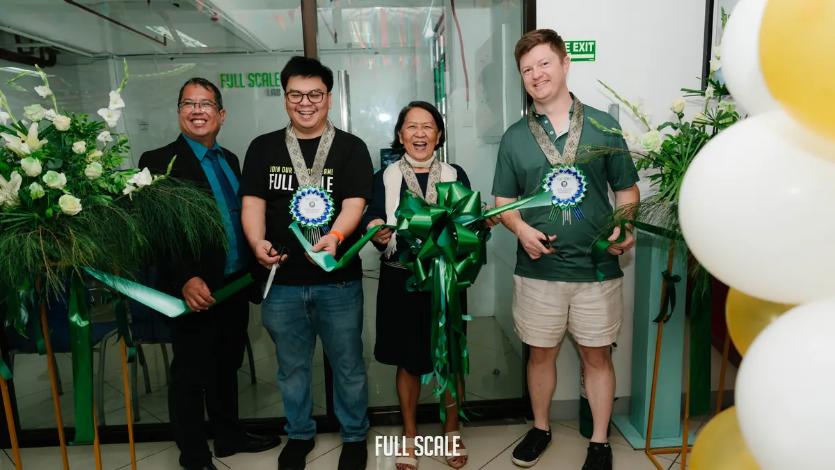 Ribbon cutting for the donated computers at Passerelles Numériques