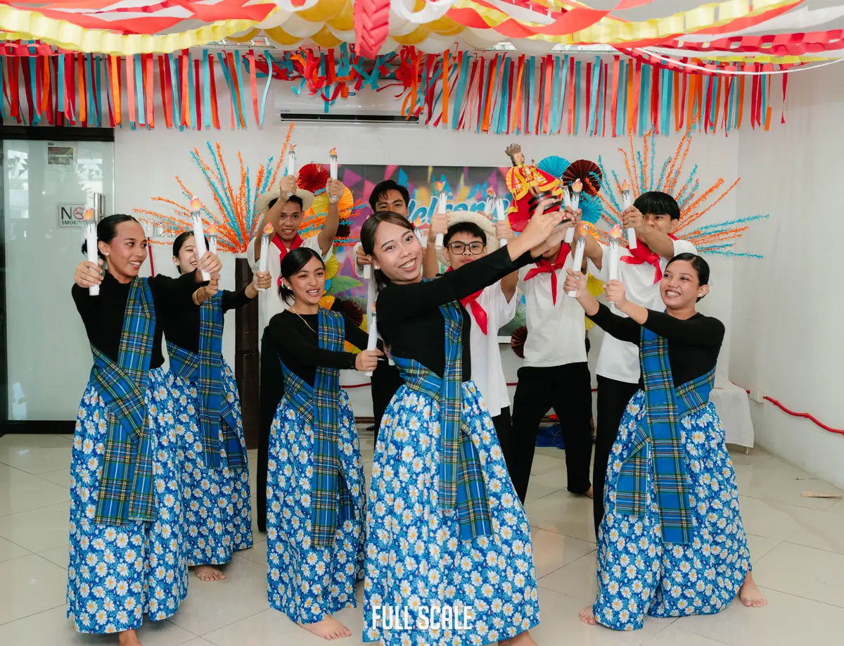 Passerelles Numériques scholars performing a traditional Filipino dance during the Full Scale computer donation visit