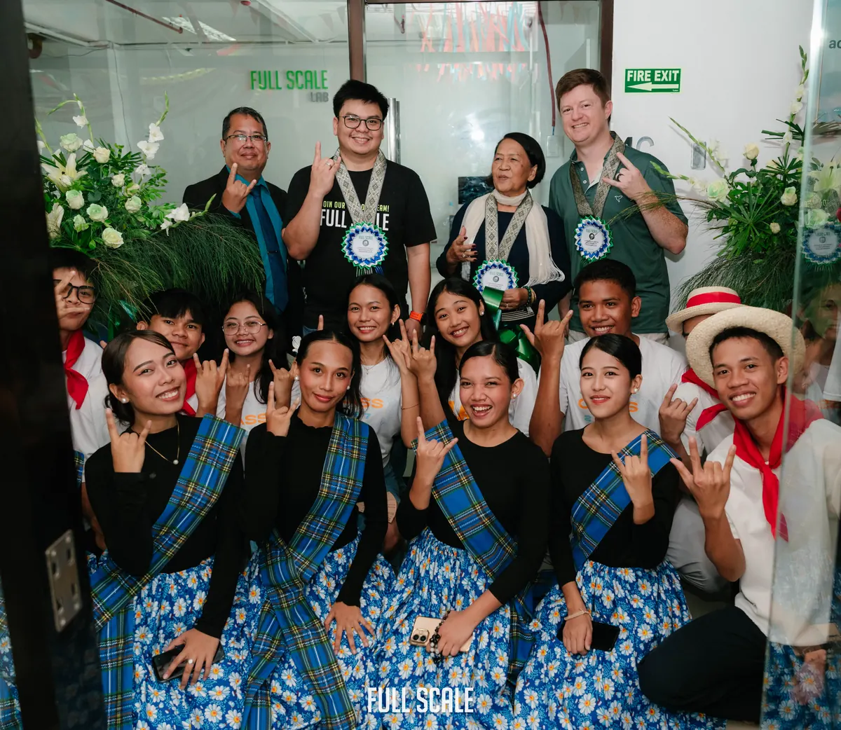 Full Scale volunteers with Passerelles Numériques scholars after the computer donation in Cebu City