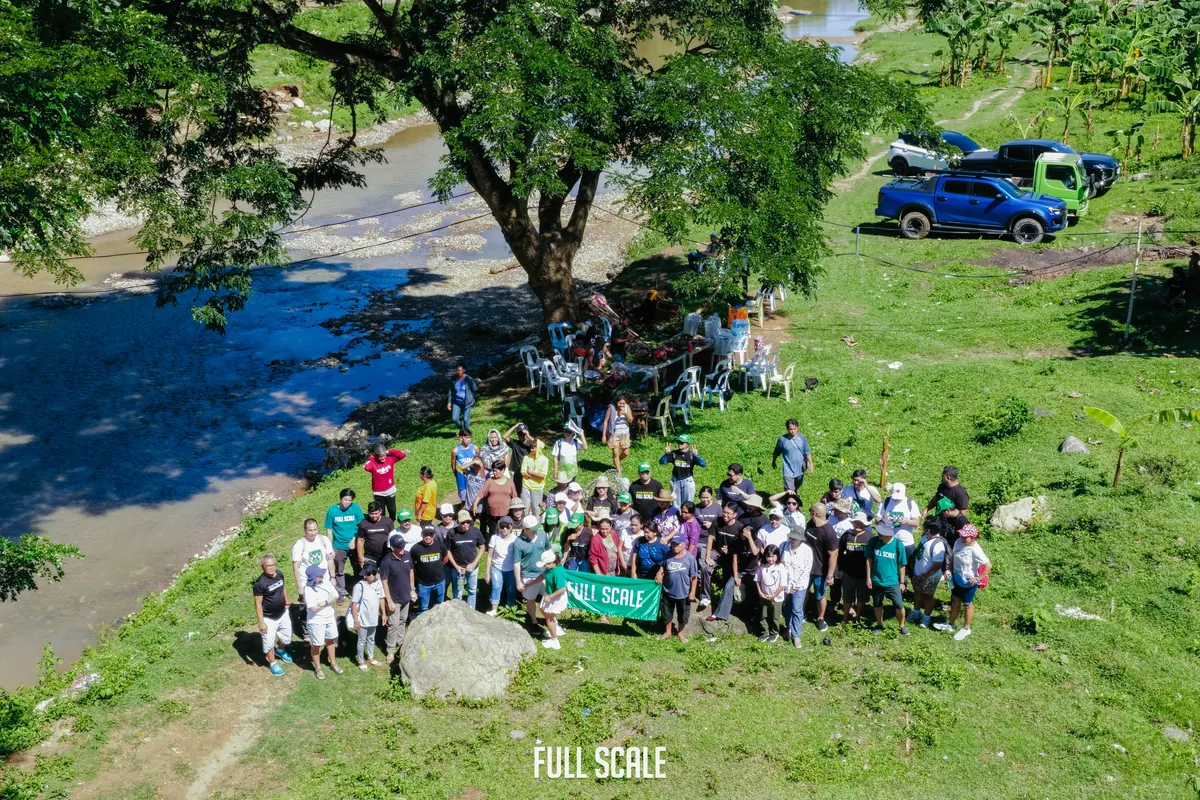 Aerial view of Full Scale volunteers at the bamboo planting site along the Jaclupan watershed